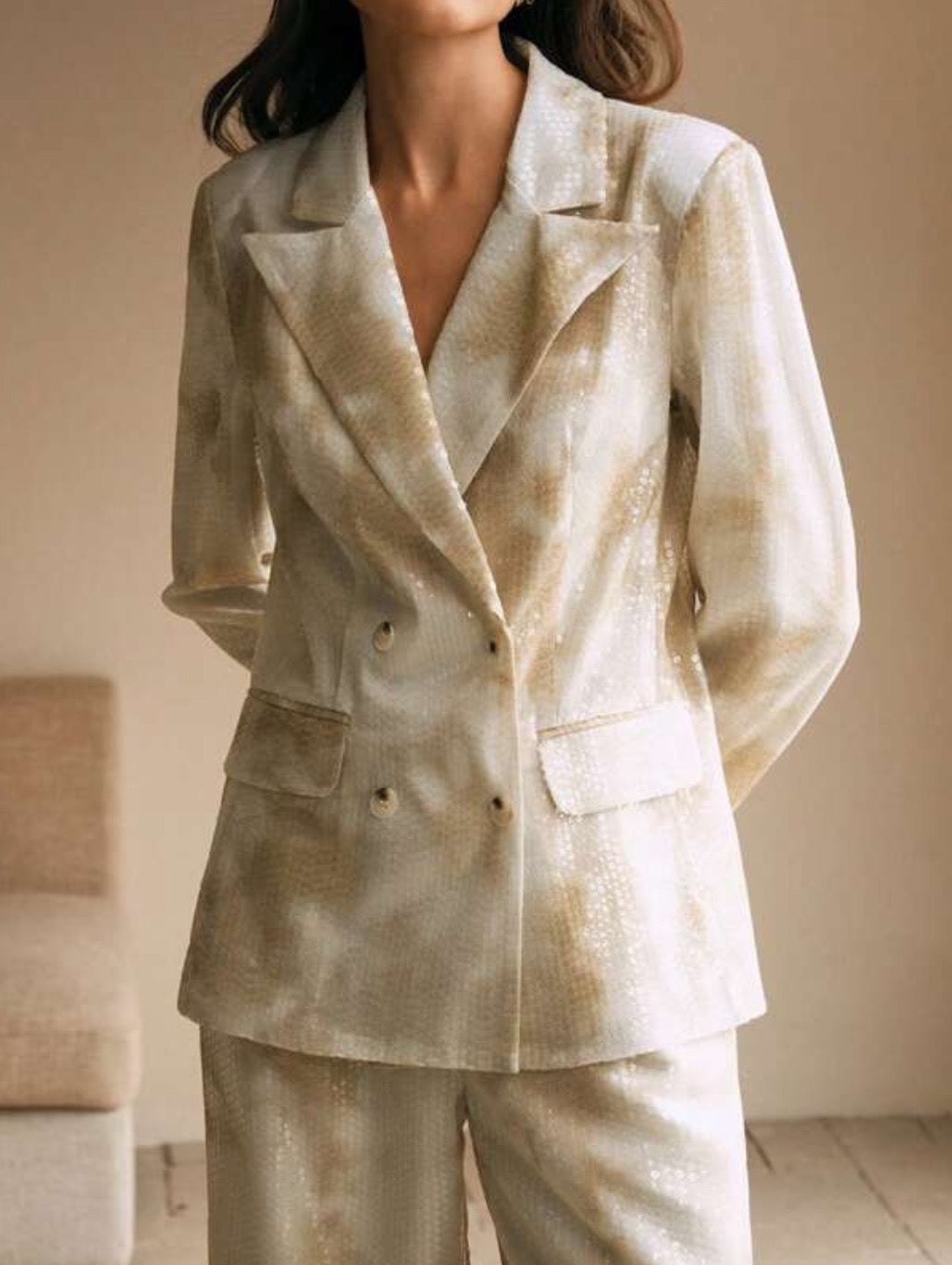 Blazer lentejuela tonos pasteles.