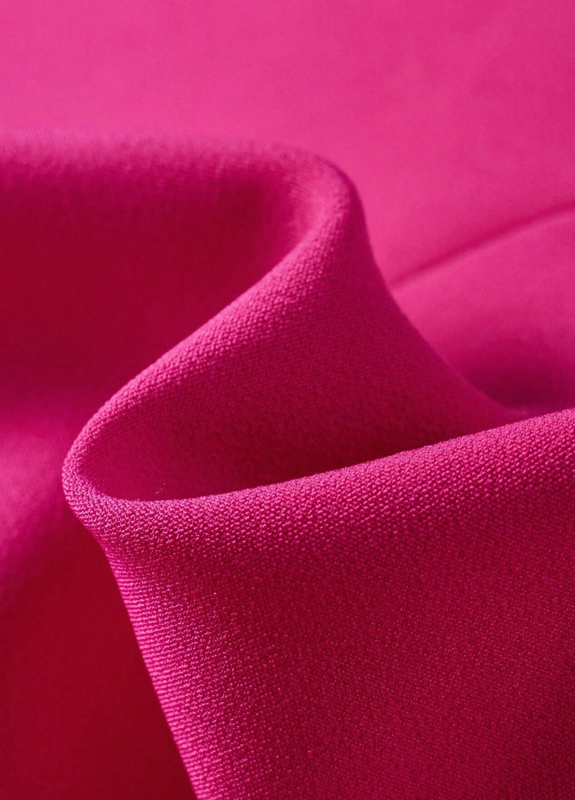 Blazer estructurado rosa fucsia mangas de flores.